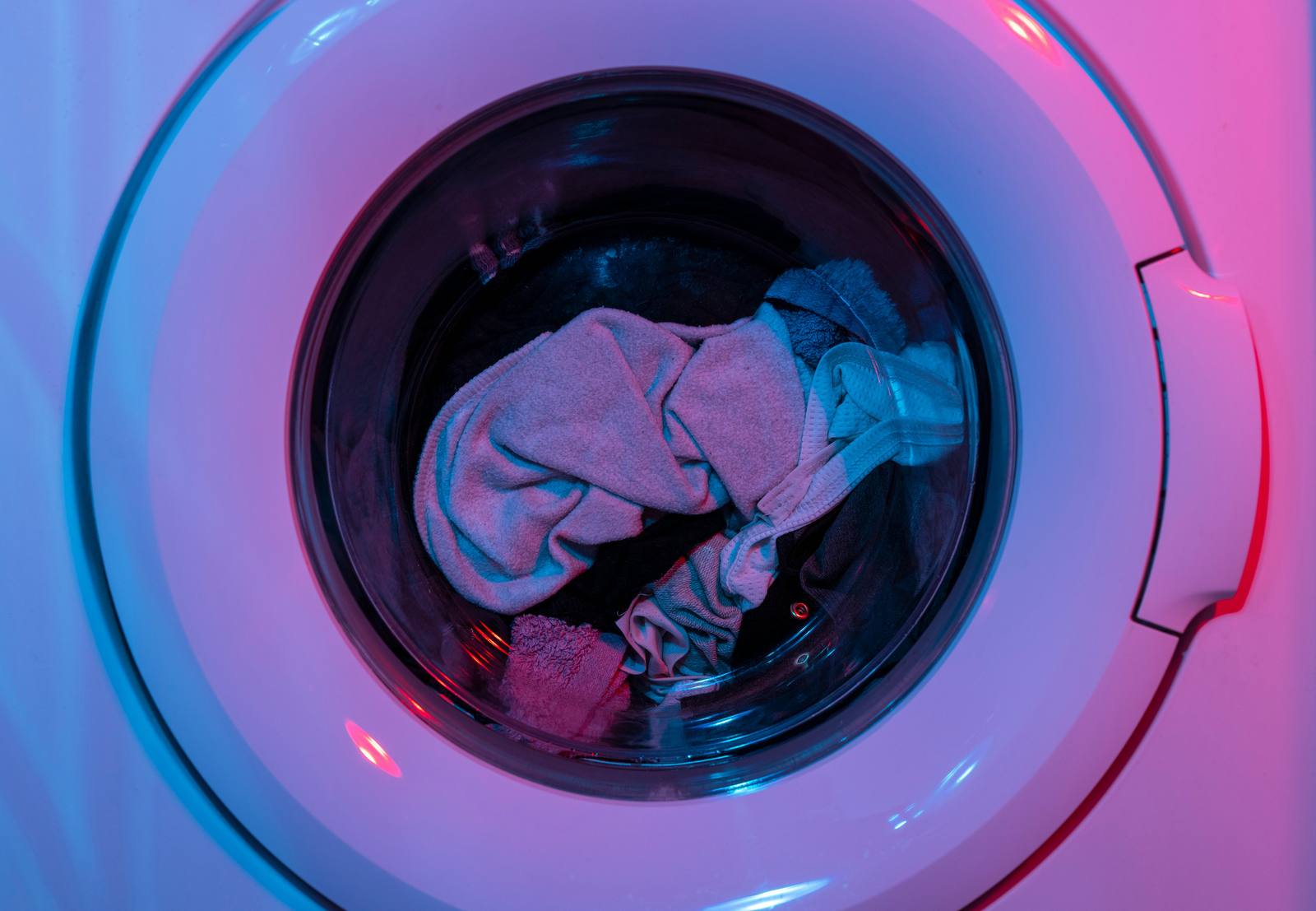 Washing machine running with vibrant lighting